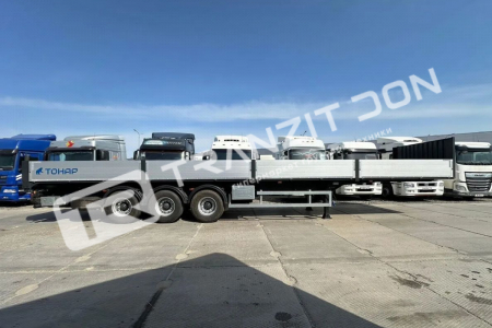 Полуприцеп бортовой с кониками Тонар B3-13/K